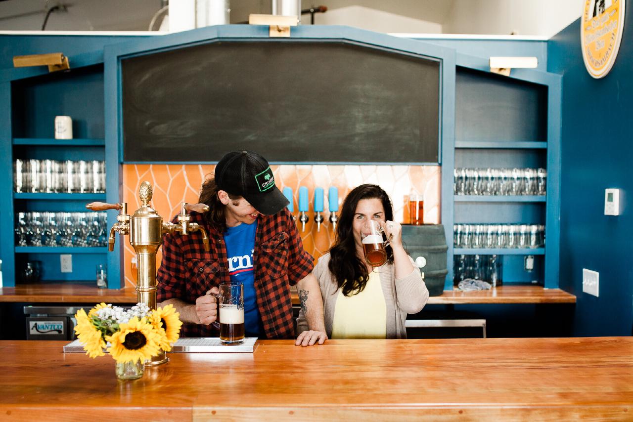 Ben and Karo behind the bar at Otherlands
